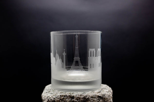 a glass with a picture of the eiffel tower on it