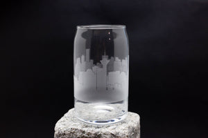 a glass sitting on top of a rock