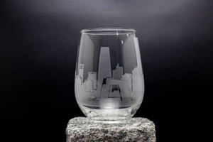 a clear glass with a picture of a city on it