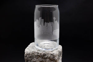 a glass sitting on top of a rock