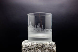 a glass with a picture of a castle on it