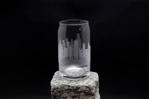 a glass sitting on top of a rock