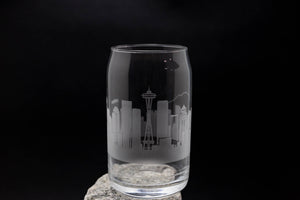 a glass with a picture of a city on it
